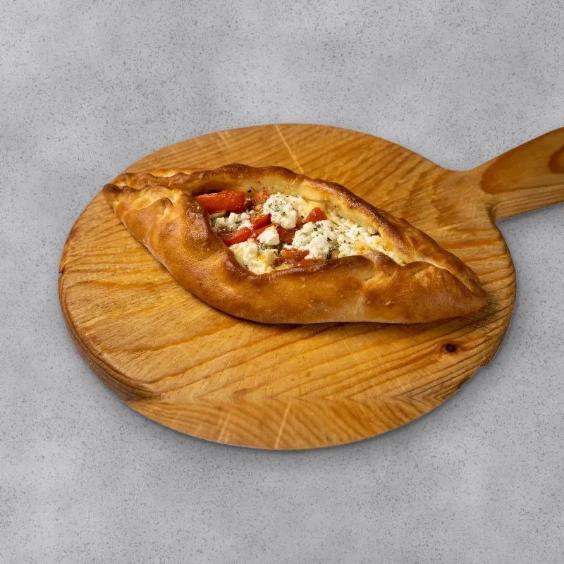 Peinirli with feta, tomato and oregano