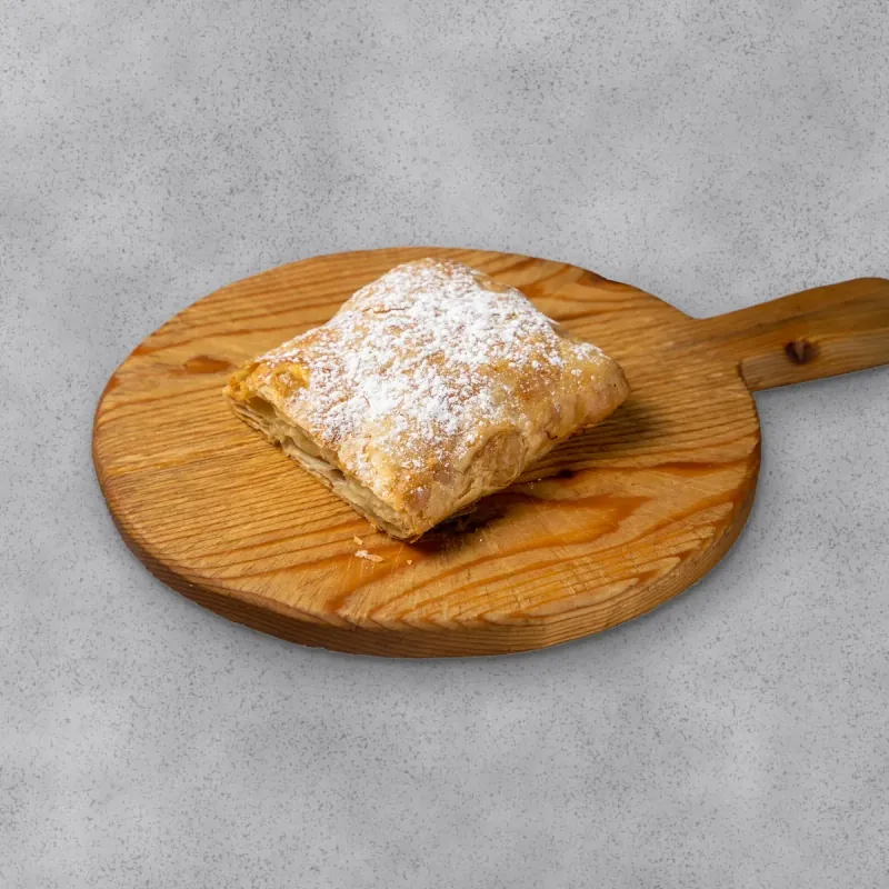 Bougatsa dusted with powdered sugar